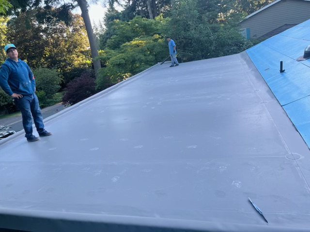 After: new TPO membrane with tapered insulation on Mercer Island